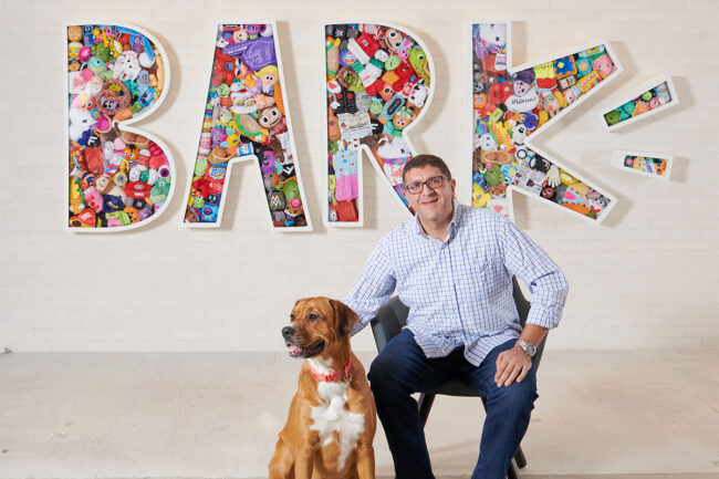 Zahir Ibrahim, chief financial officer of BARK with his dog Oscar