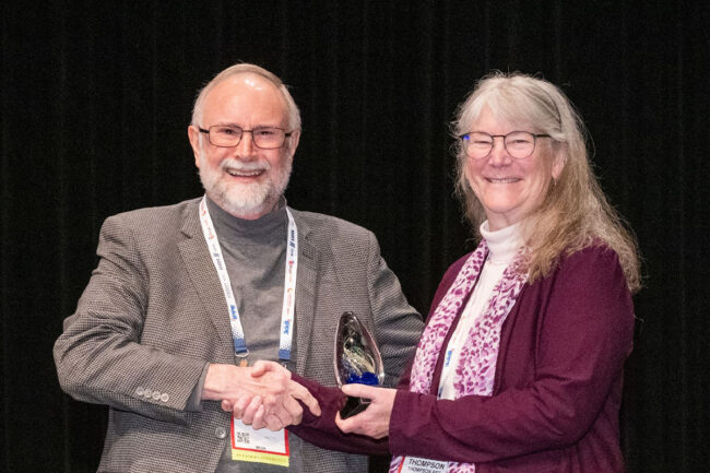 Jerry May, vice president of government and trade affairs at Freshpet, presenting Angele Thompson with the 2024 Friend of Pet Food Award