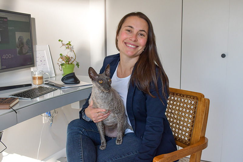 Emilie Mesnier with her Cornish Rex Cooper