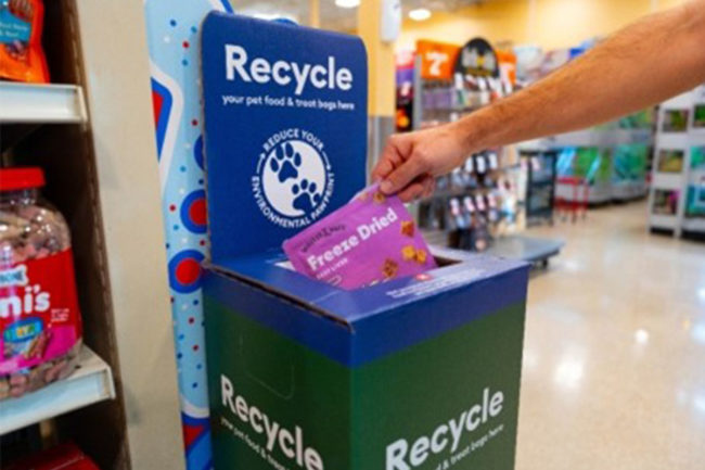 Consumer recycling pet food bag at PetSmart